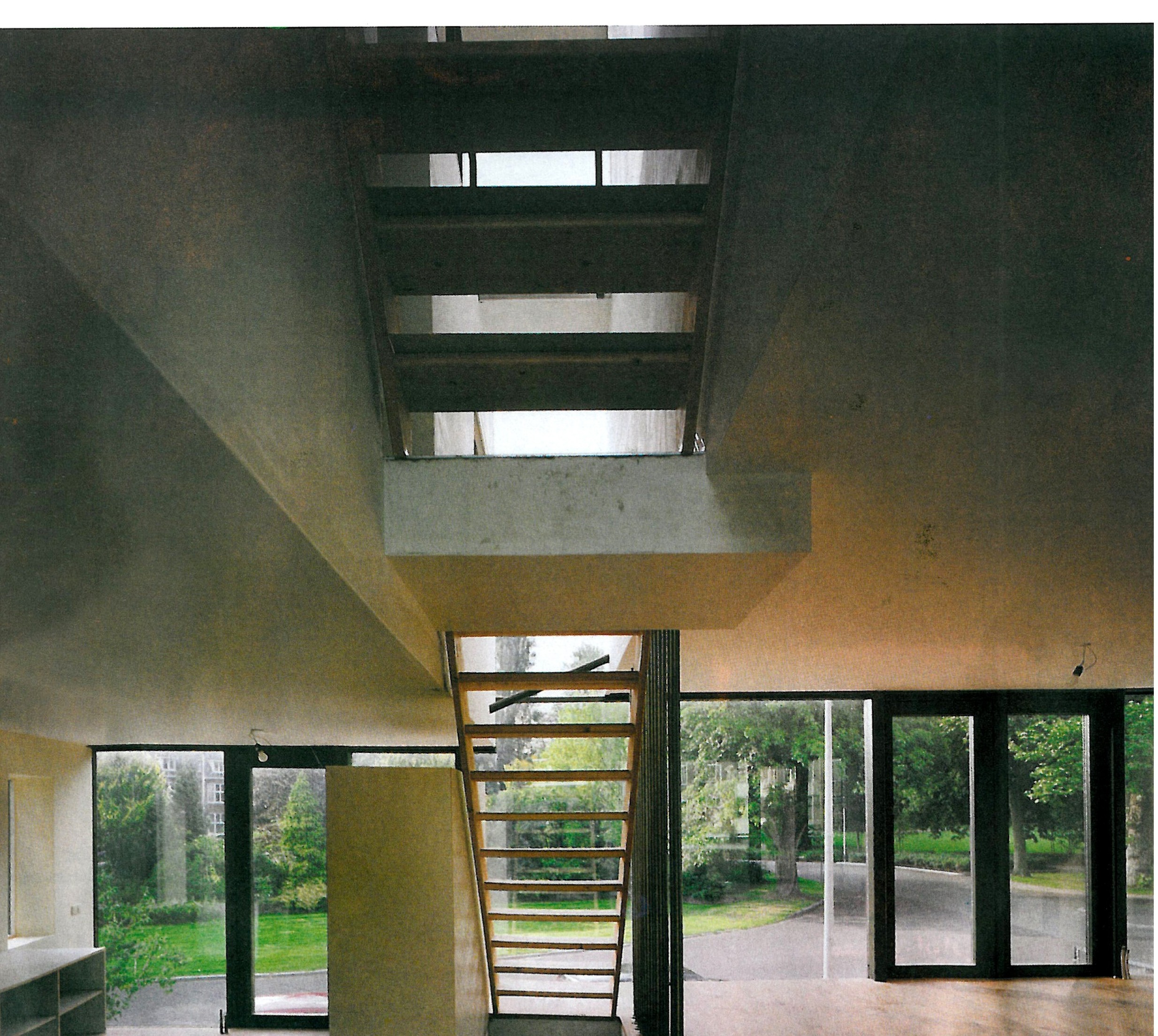 House 2 level 2 upper-floor living room on street side
