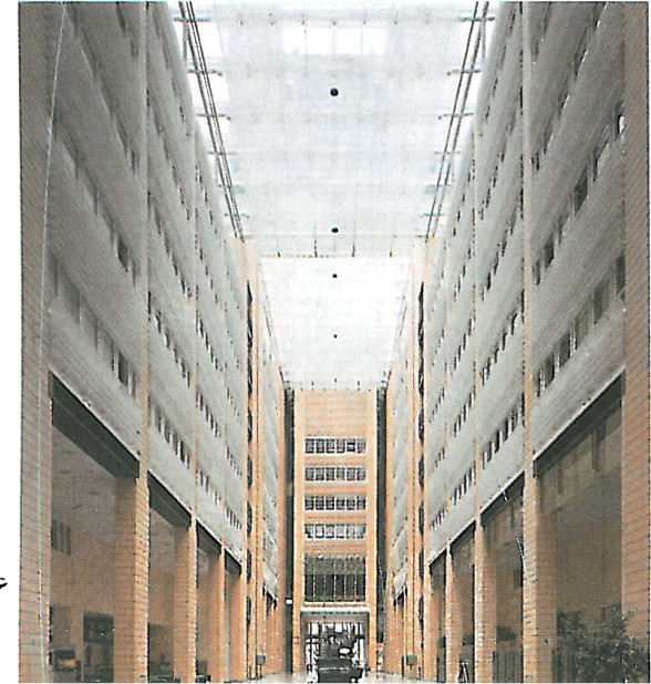 Interior corridor of the Arkaden shopping arcade, lined with shop fronts