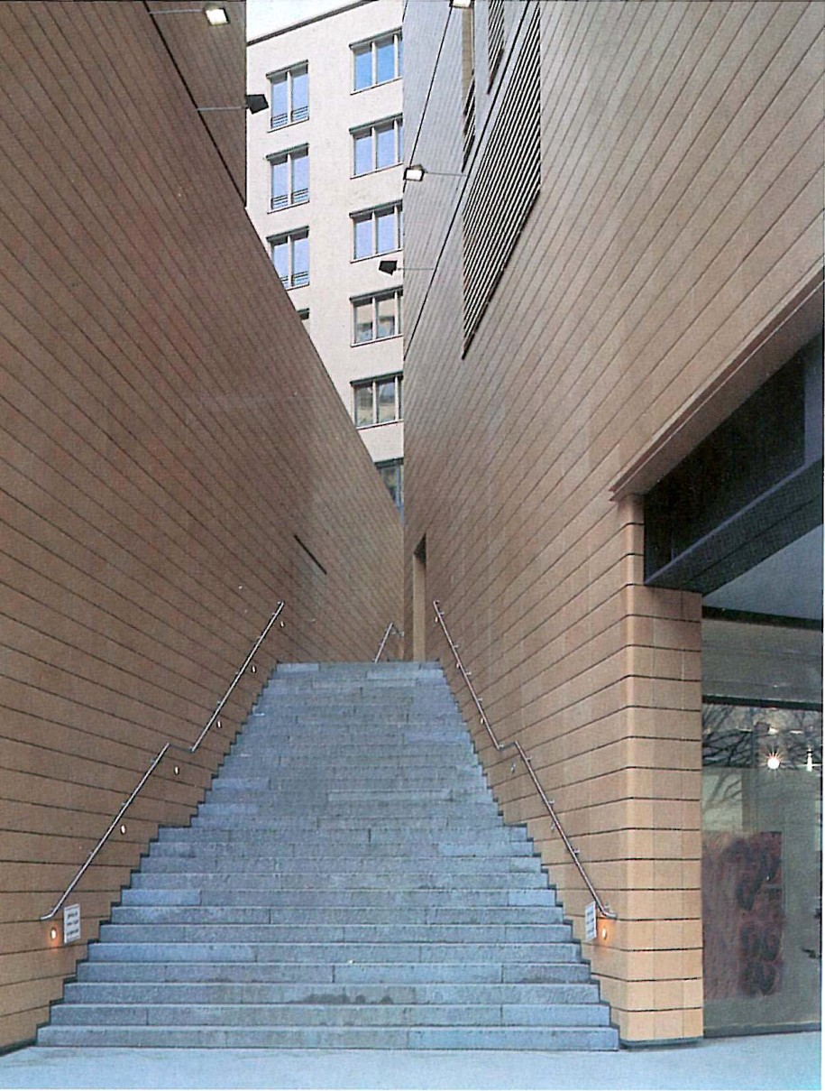 Blue-tiled staircase between Isozaki's gateway buildings