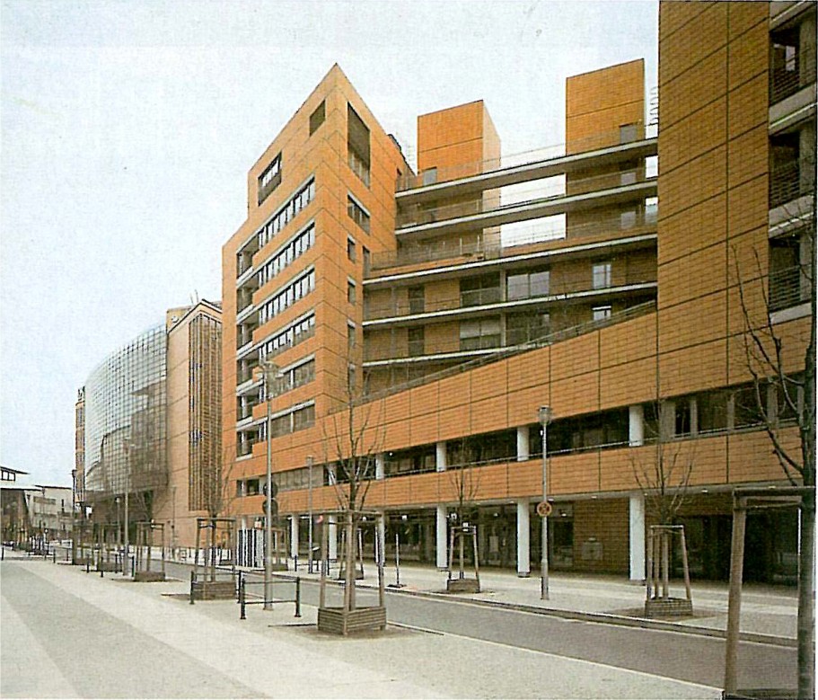 Coloured timber-and-glass facade of the IMAX 3D theatre by Piano–Kohlbecker