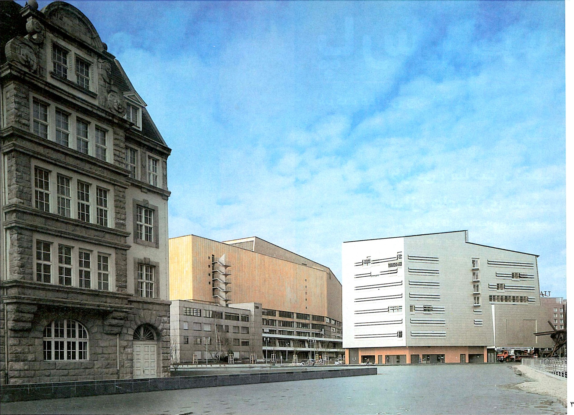 Plaza view with one of the surviving historicist buildings juxtaposed against the new blocks