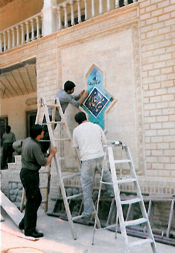 Installing the sign of the museum