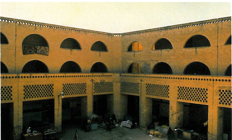Two-storey brick bazaar arcade around the central plaza of Shushtar New Town
