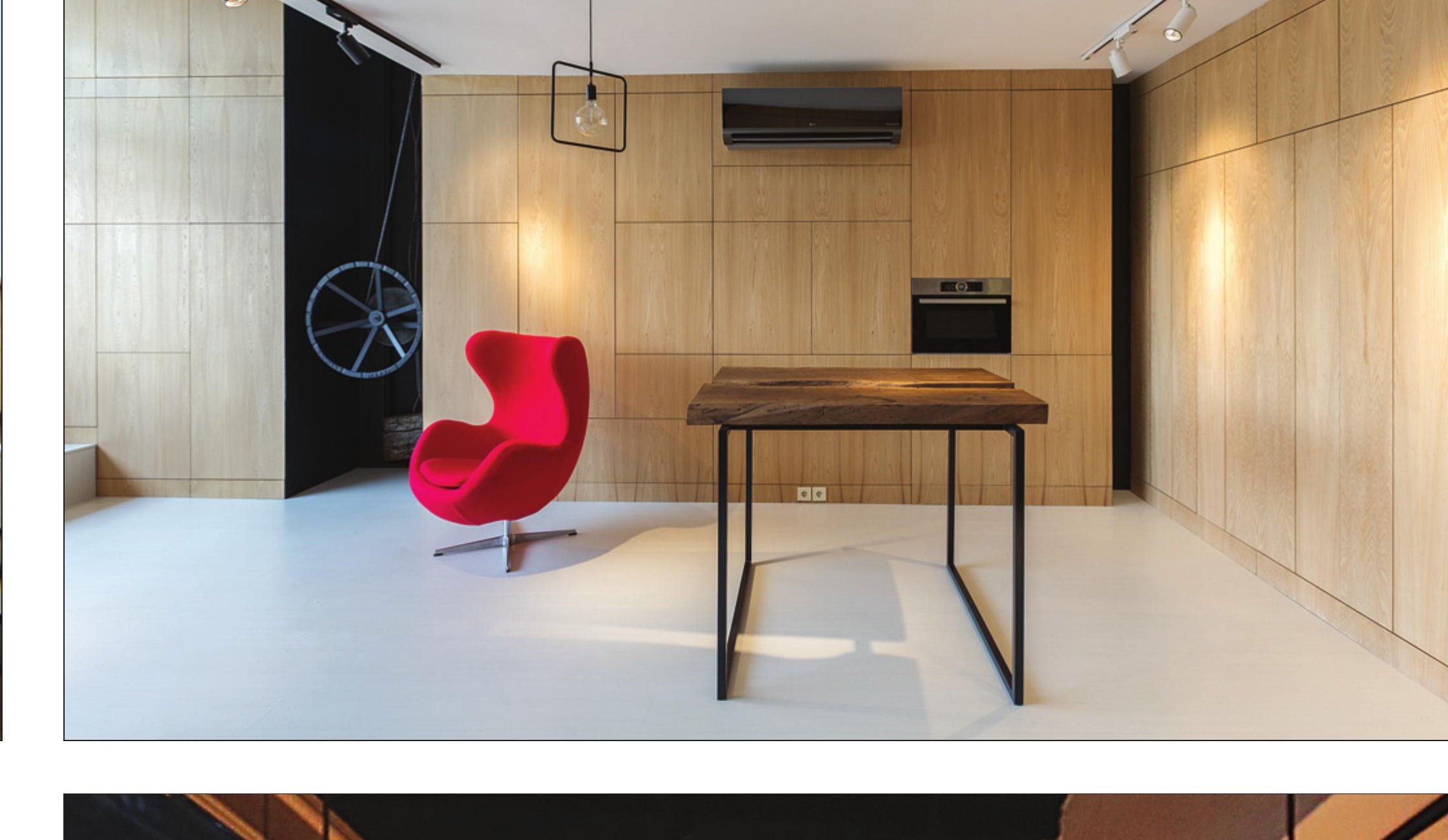 Wood-clad living space with a single red chair