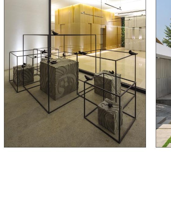 Interior dining or meeting room of Dove Residential with sculptural framed-cube installation