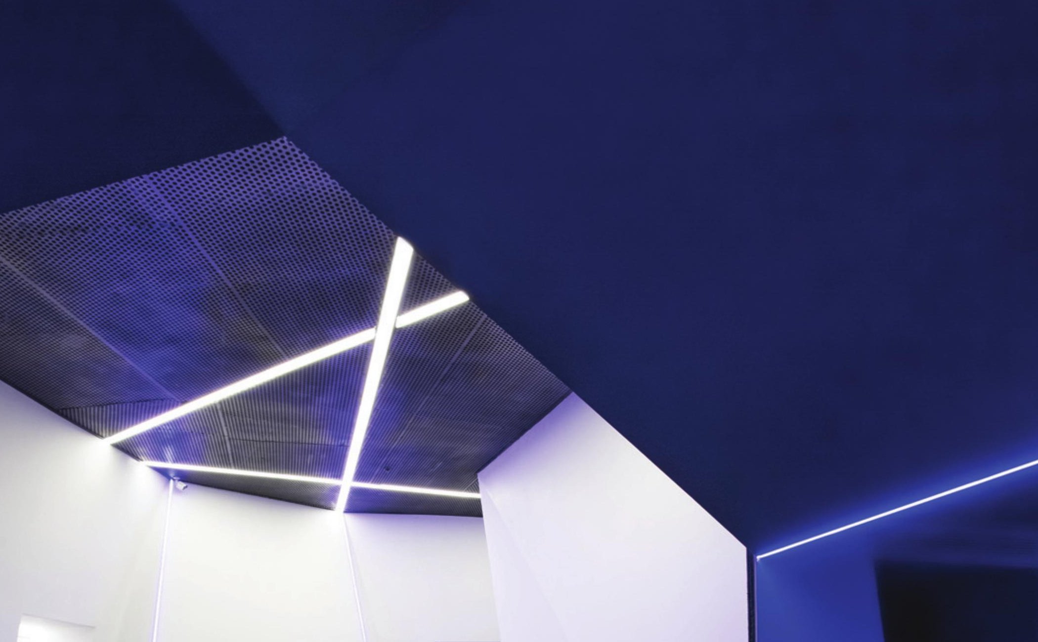 Dark blue entrance corridor with triangulated form