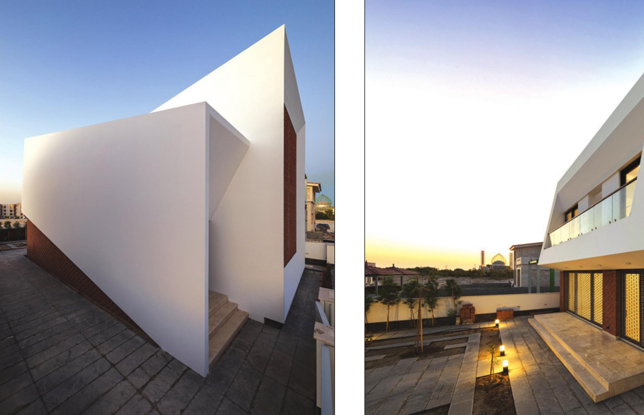 Courtyard pool at night with white volumes