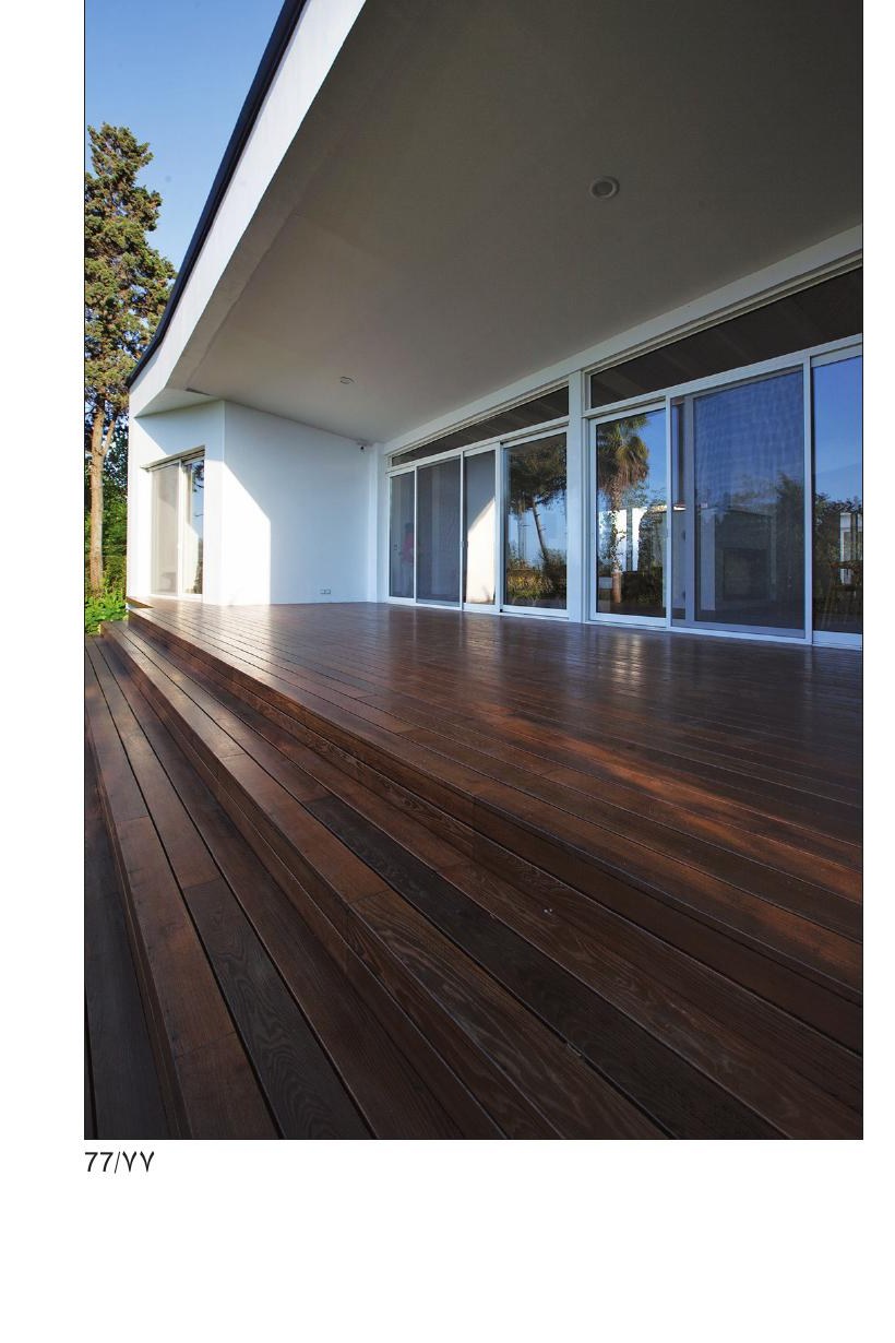 Wood-decked terrace of White House 1 facing the garden