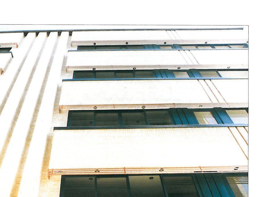 Zarrin Office Complex — façade detail with vertical ribs.