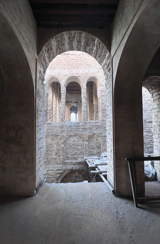 View through layered arches, creating depth and perspective