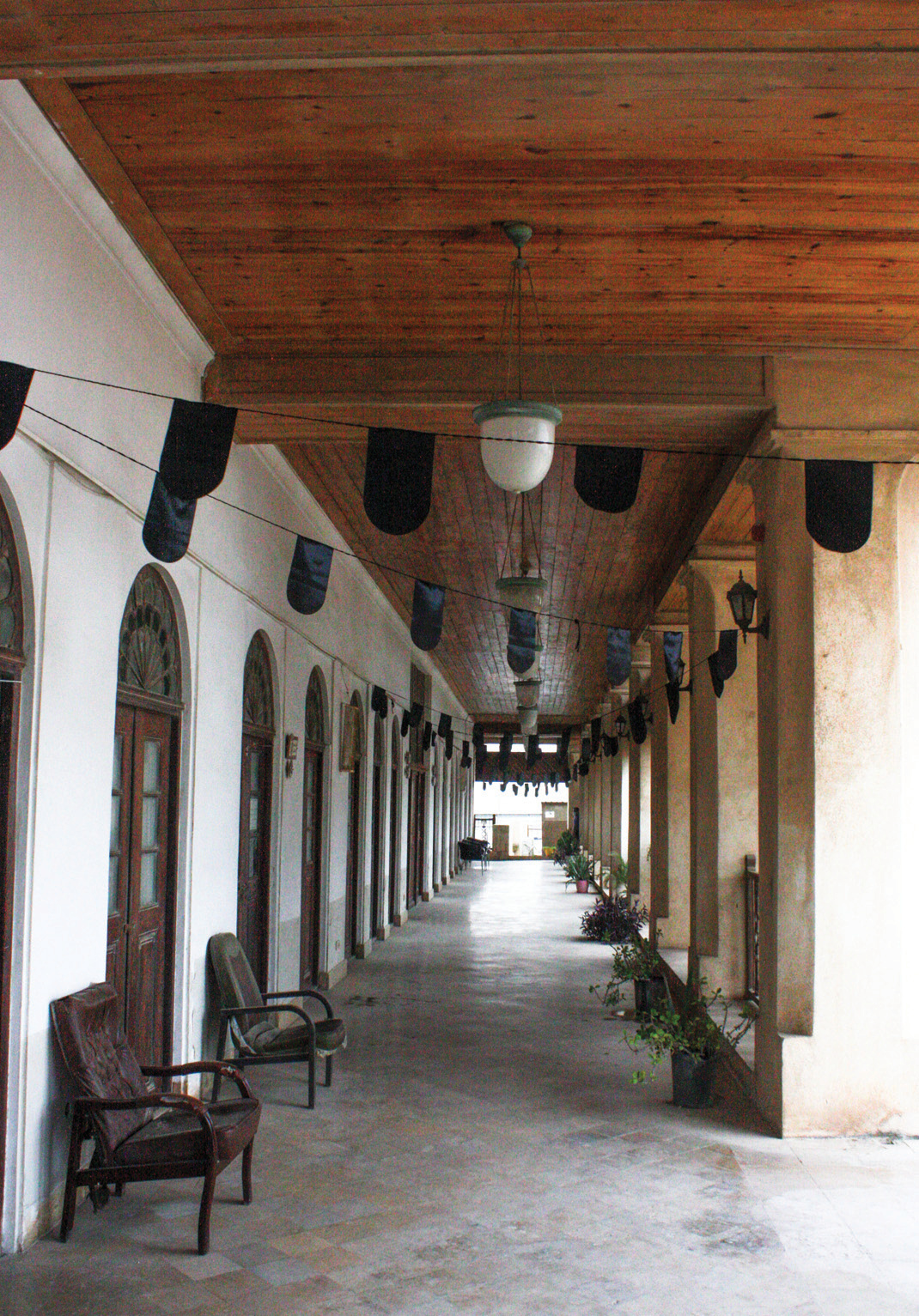 Deep iwan (porch) with wooden ceiling in a Bushehr historic building