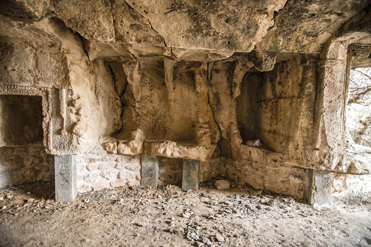 Interior showing burial niches carved into the rock walls of the Palmyran temple-tomb