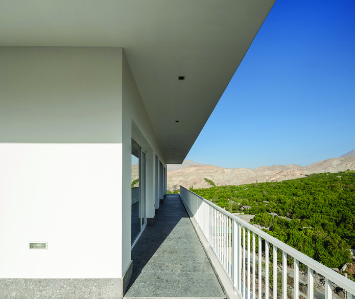 Balcony view looking north over the green valley of Lavasan