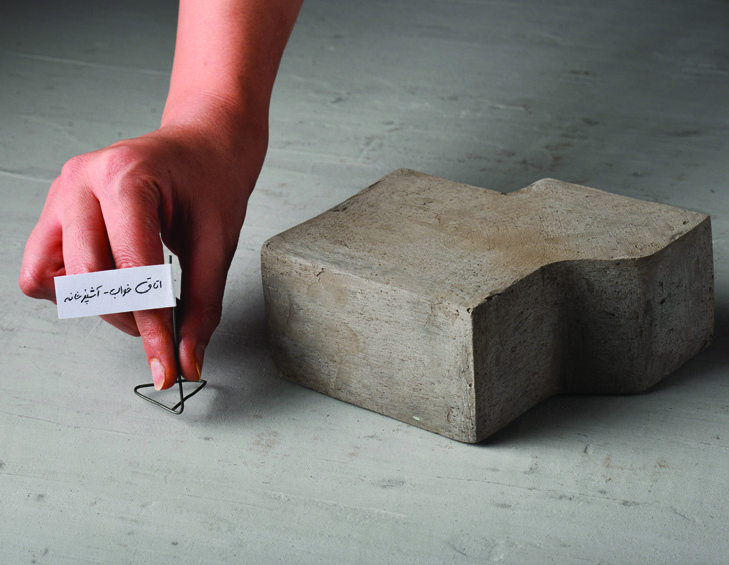 Close-up of the physical model showing the bedroom-kitchen module with its rectangular geometry