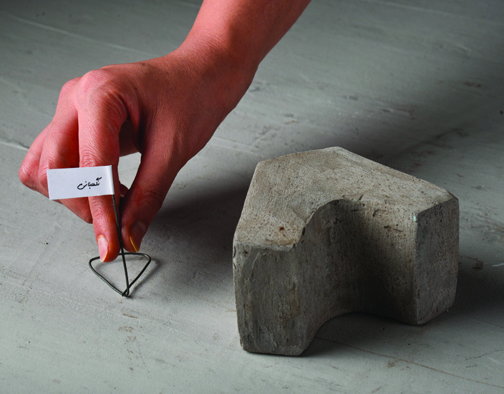 Close-up of the physical model showing the horseshoe-shaped guardroom module