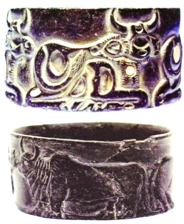 Two ancient stone vessels from Jiroft decorated with bull motifs in relief
