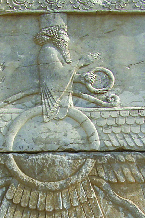Close-up of the covenant ring held in the hand of a Faravahar relief carving, an ancient Zoroastrian symbol