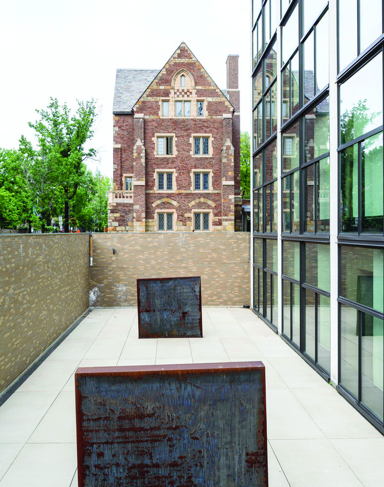 Color photograph of the sculpture terrace at the Yale Art Gallery, with modernist sculptures displayed outdoors against the backdrop of a Yale Gothic building