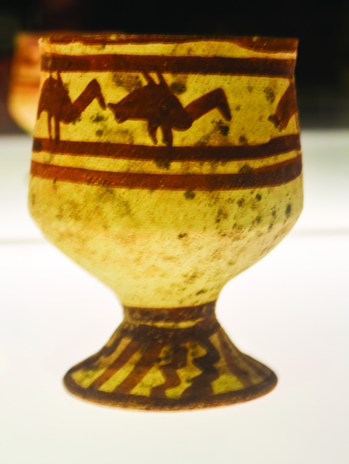 Ceramic vessel from Shahr-e Sukhteh decorated with geometric patterns including zigzags and lines