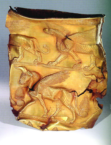 Fragmentary golden vessel from Marlik depicting a winged bull and griffin in repousse relief