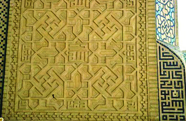 Intricate brickwork pattern featuring interlocking Mithraic cross motifs on the facade of a historic mosque in Isfahan