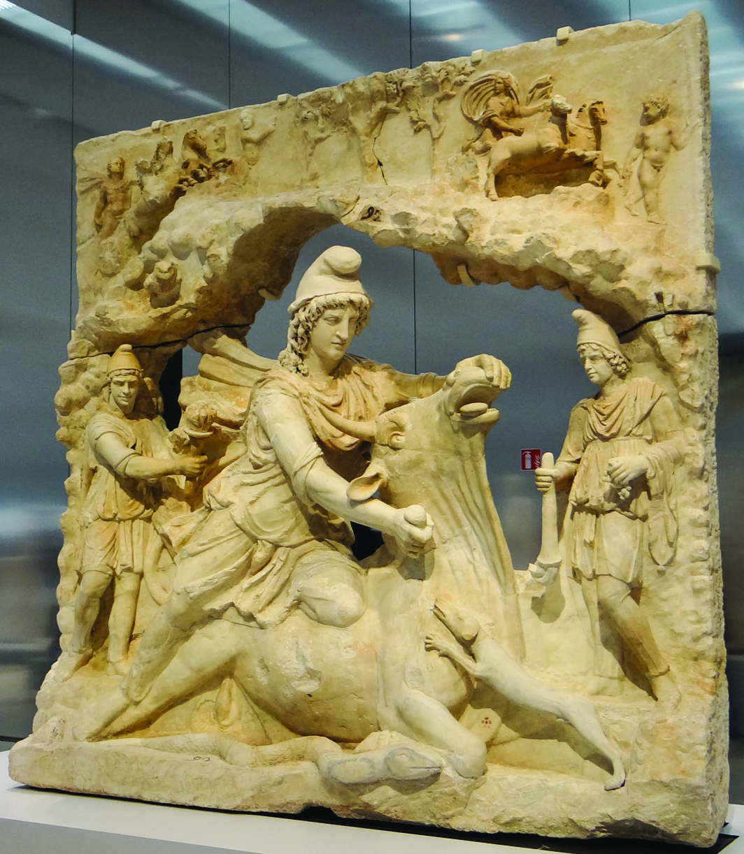 Marble tauroctony sculpture from the Louvre Museum showing Mitra in a Phrygian cap slaying the sacred bull, flanked by two torch-bearers, with a raven, dog, and scorpion