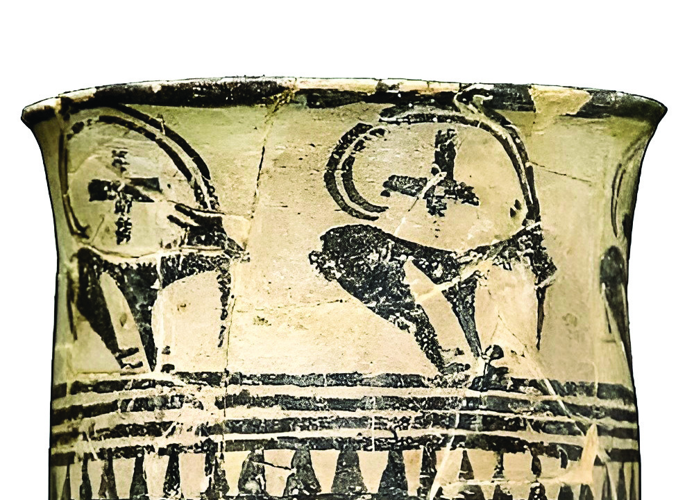 Detail of an ancient ceramic vessel from Sialk showing painted ibex goats with large curving horns containing a chelipa (cross) symbol at their centre, now in the National Museum of Iran