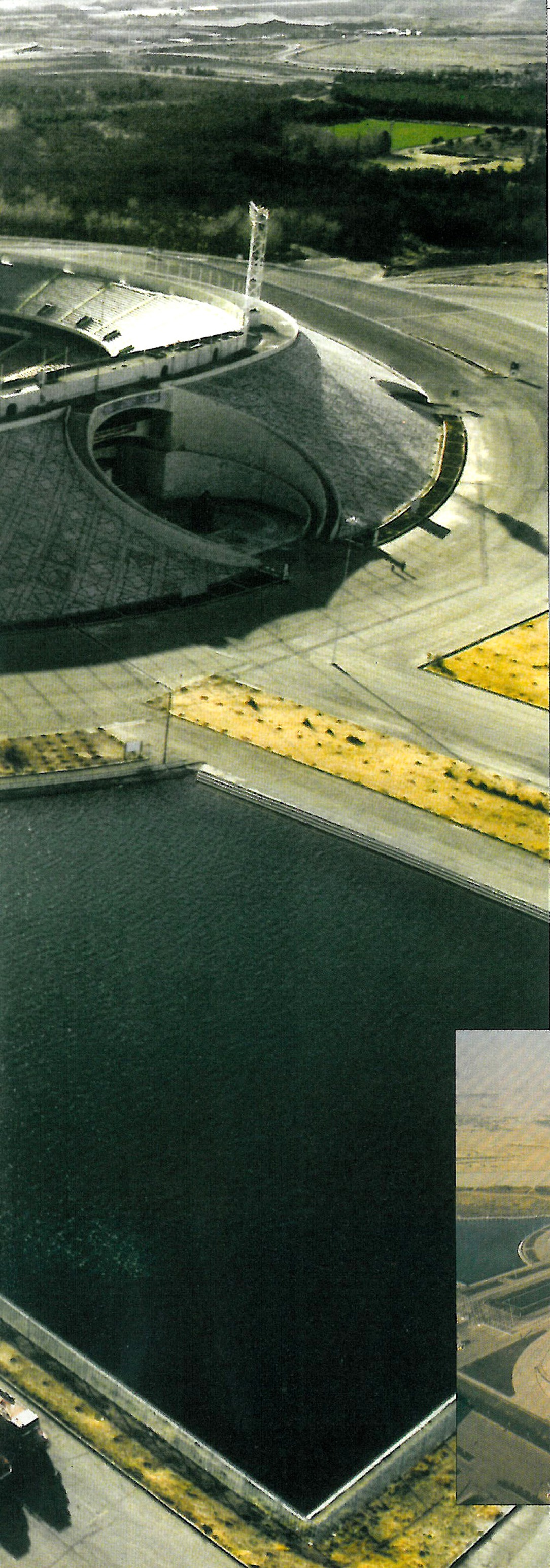 Perspective of the standing yellow volume and the cleft surface at the centre of the site