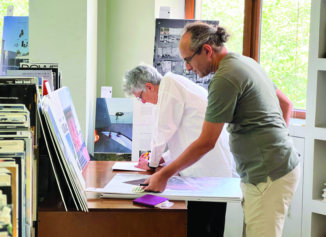 Jury members reviewing project submissions on display boards during the 25th Memar Award deliberation