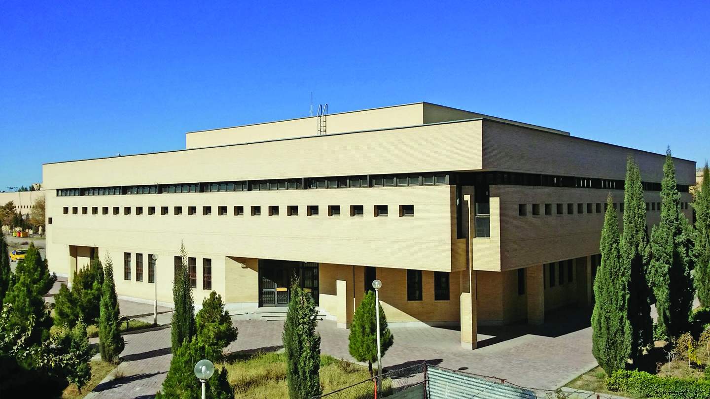 Central library exterior view showing modernist brick and concrete design