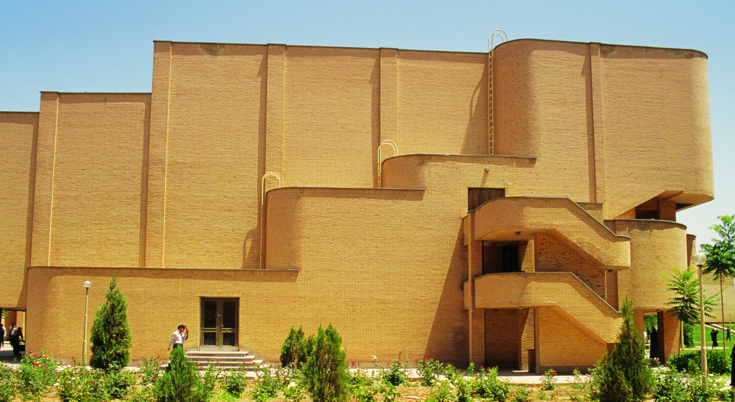 Conference hall exterior with curved brick facade