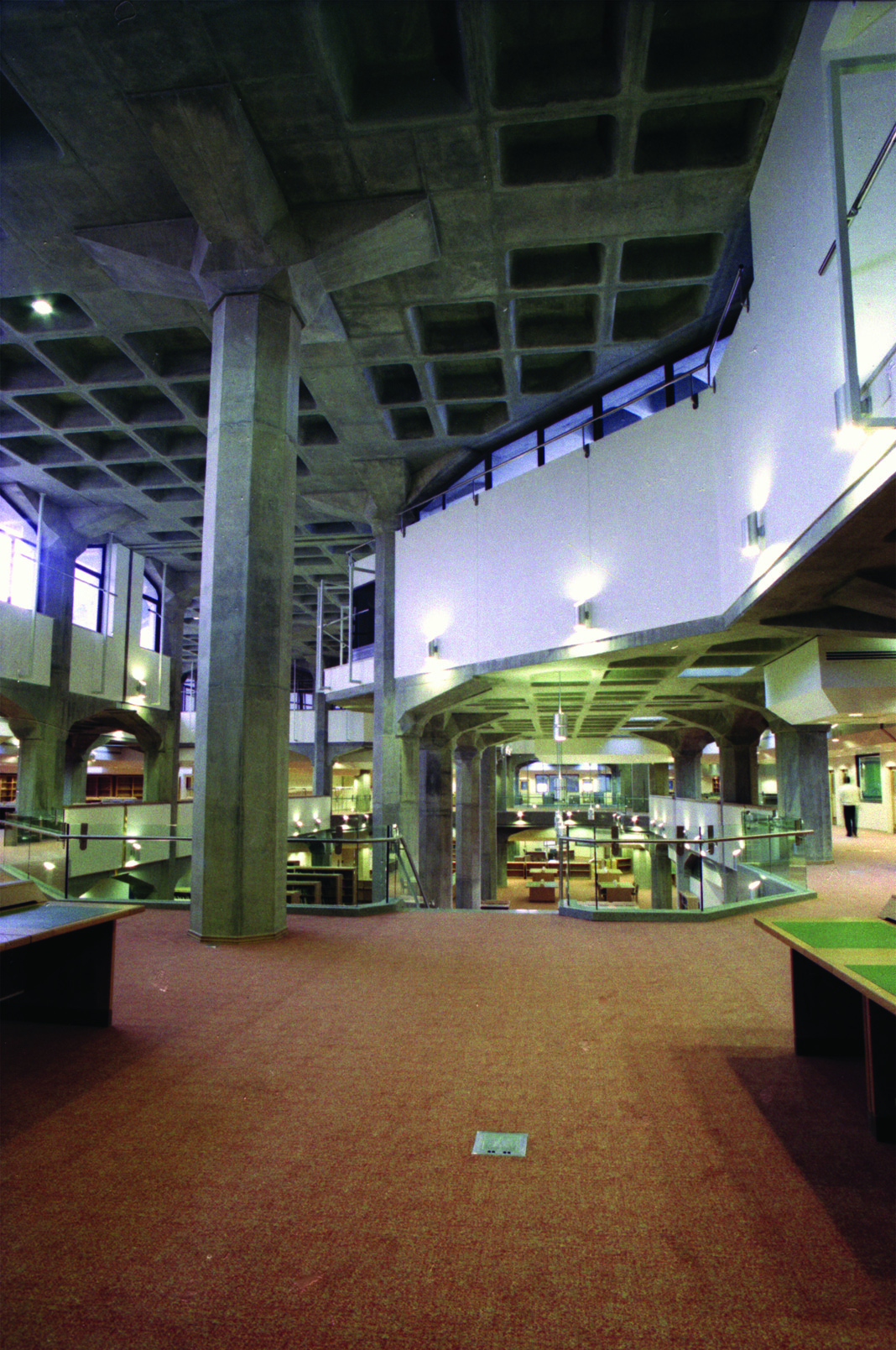 Interior of the National Library reading hall with columns and mezzanine levels