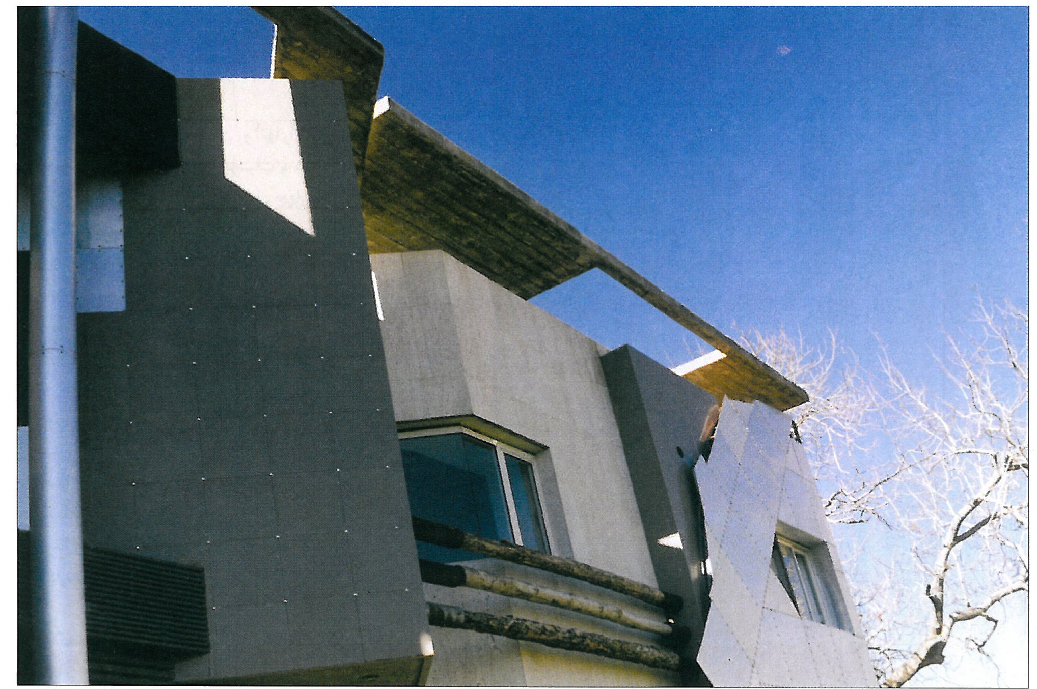 Construction details of the brick face and the broken-stone wall at the building's foot