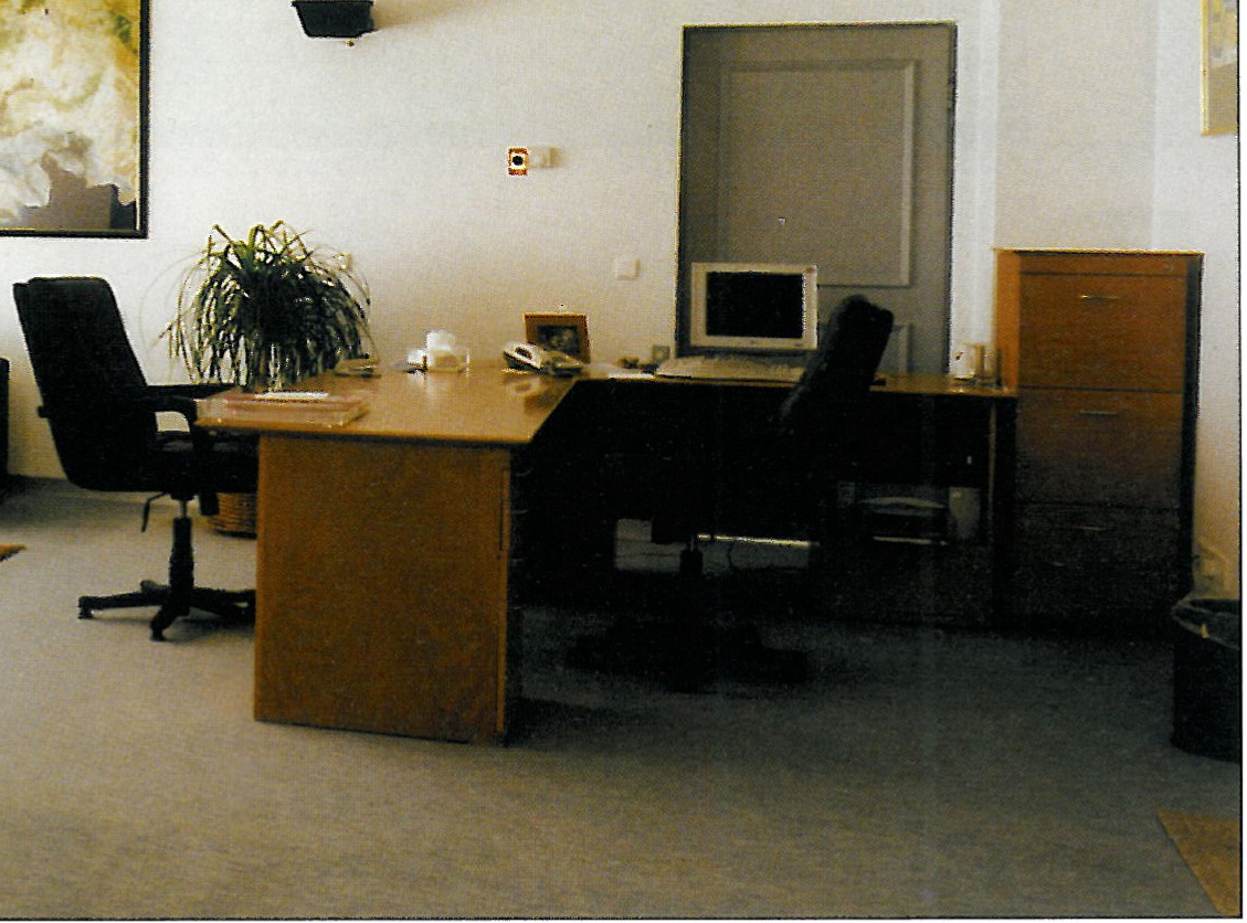 Another view of the open work-floor: columns picked out by light, metal-halide projectors on column and wall