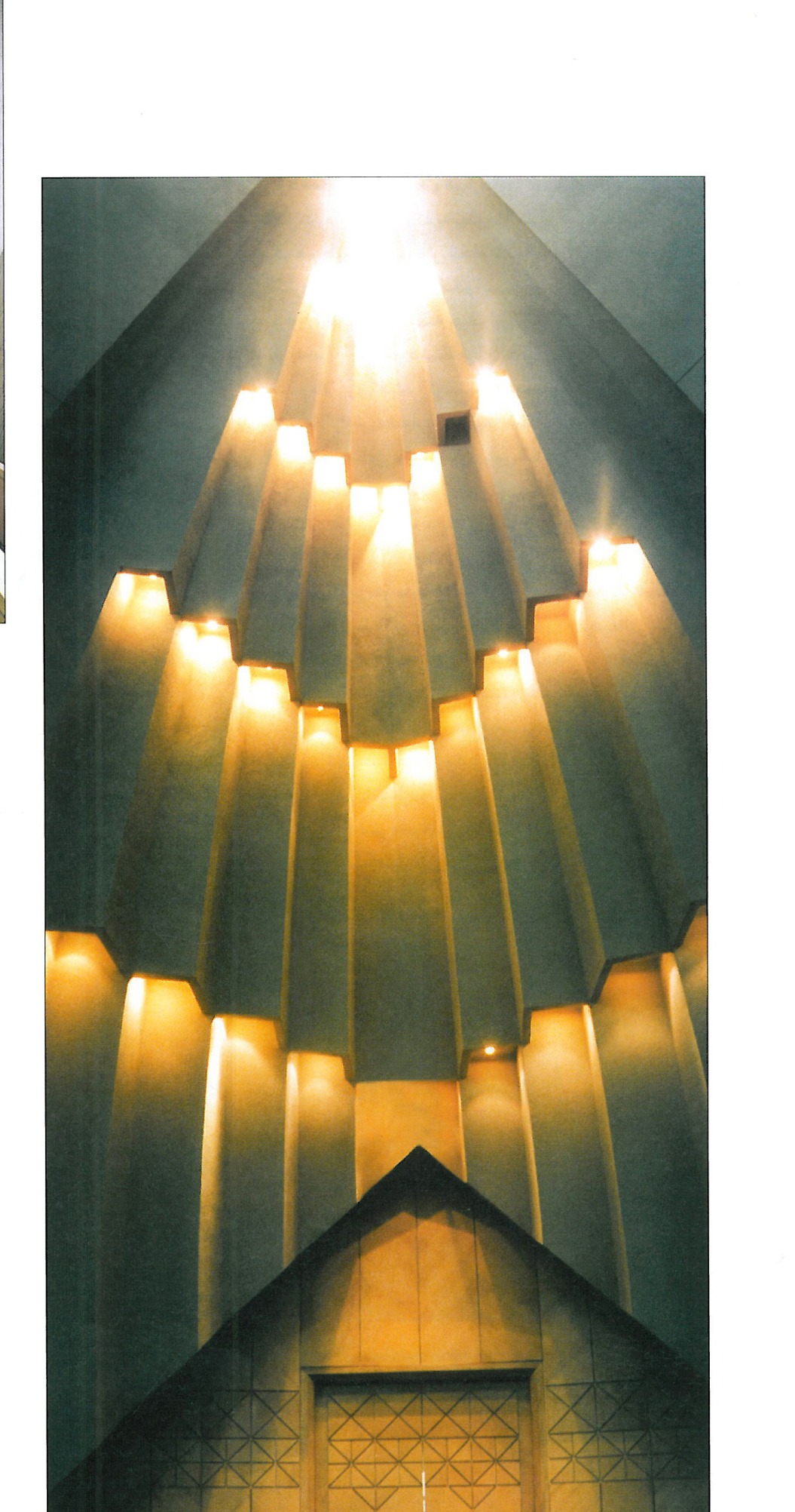 Interior view of the dramatic entrance hall with tiered lighting inspired by muqarnas