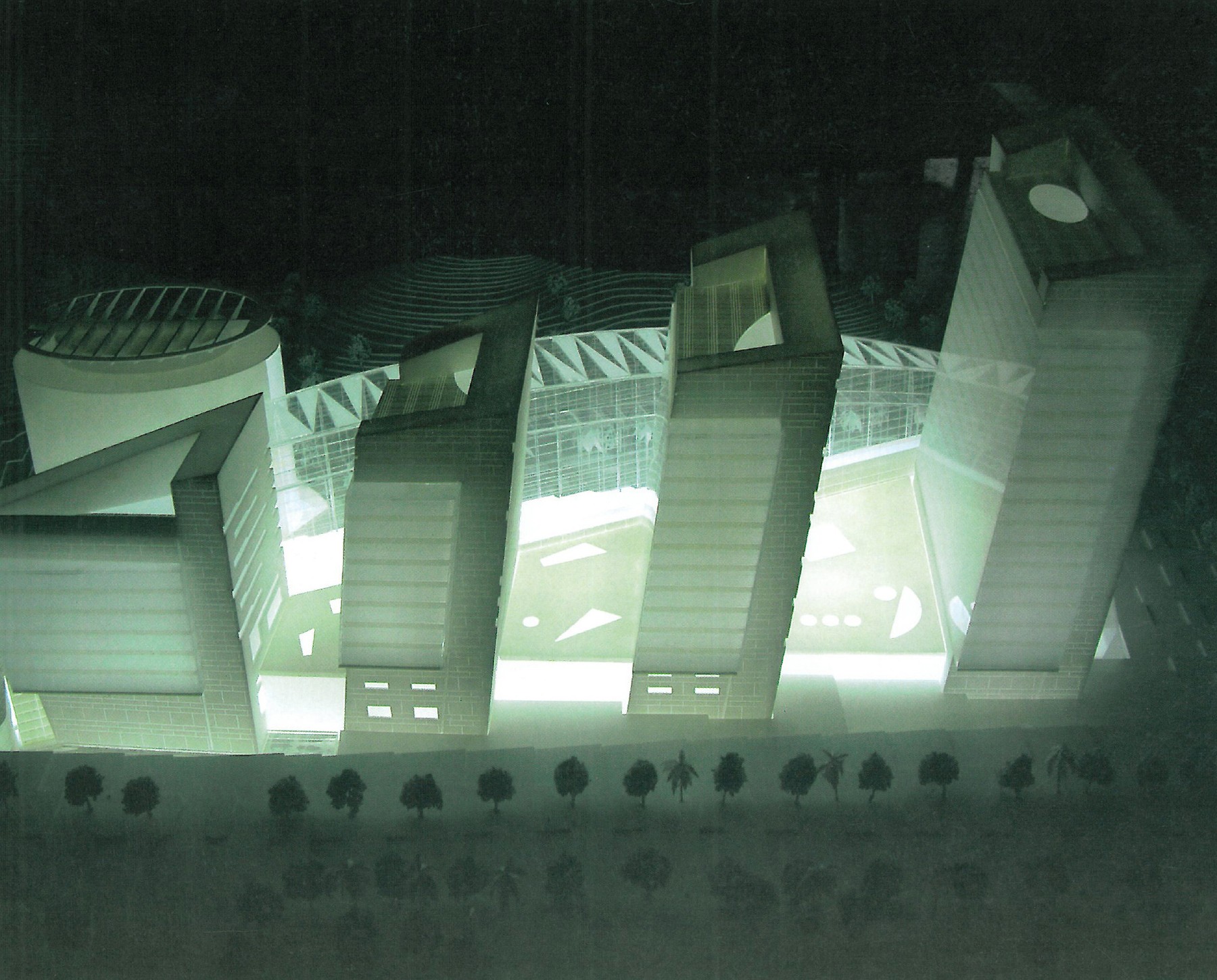 Entry 2 — aerial night view of the model showing the illuminated stepped buildings along the spine