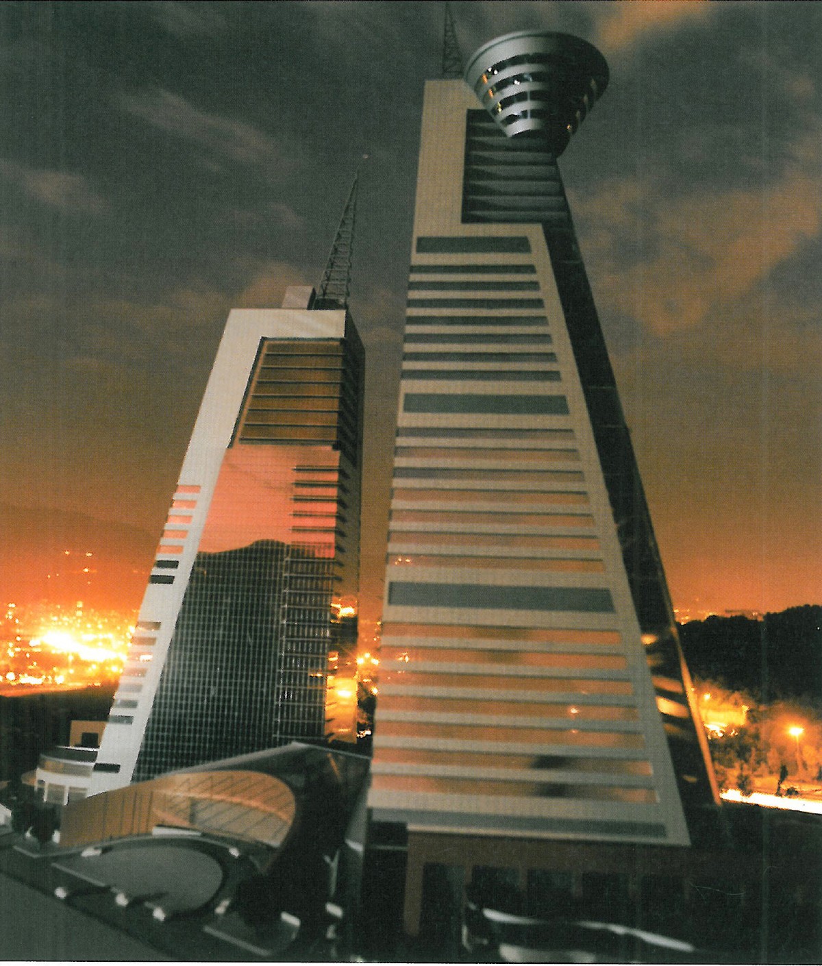 Entry 4 — night view of the stepped pyramidal tower against the city skyline
