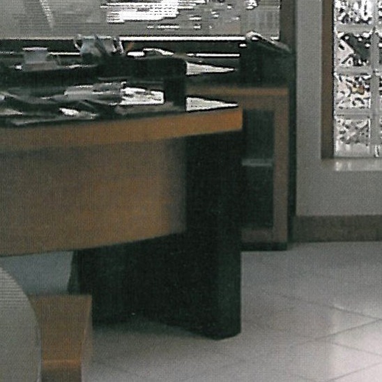 The entrance hall with two desks (for secretaries)