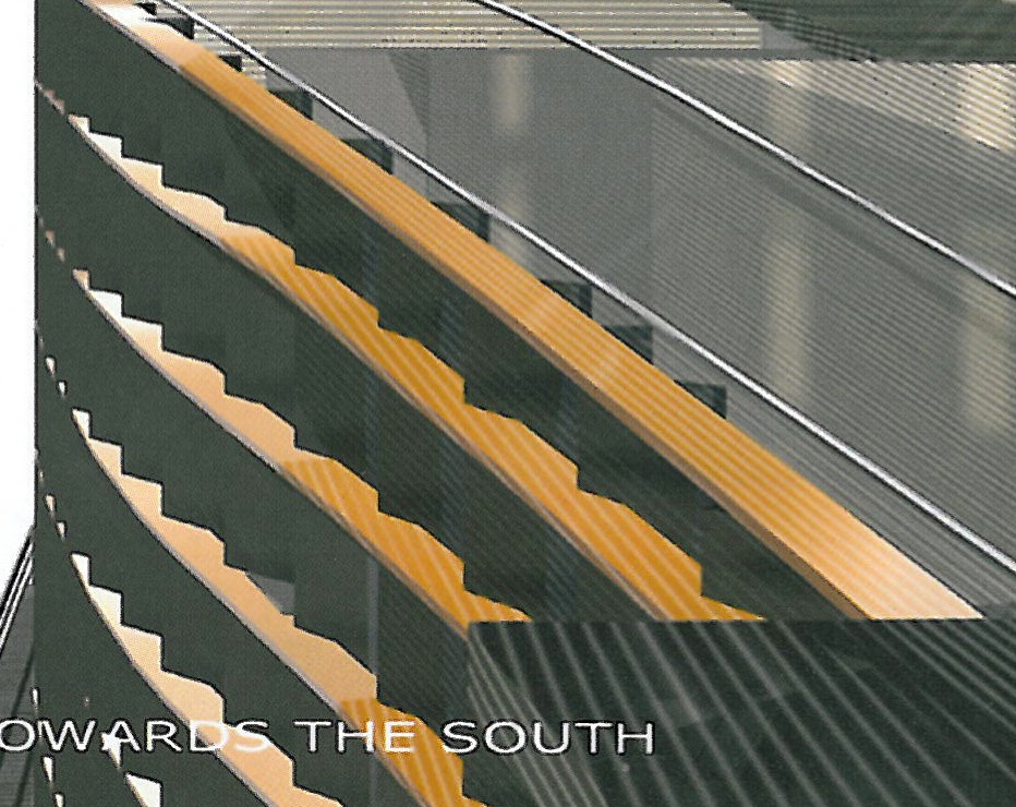 The yellow stairwell rising to the offices on the mezzanine
