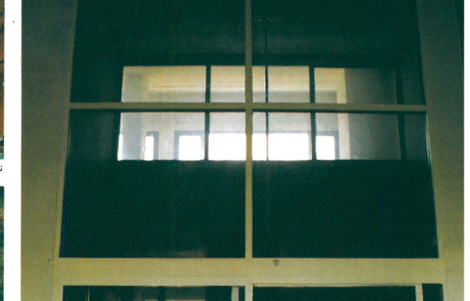 Living room of the Zaferanieh house: tall floor-to-ceiling window