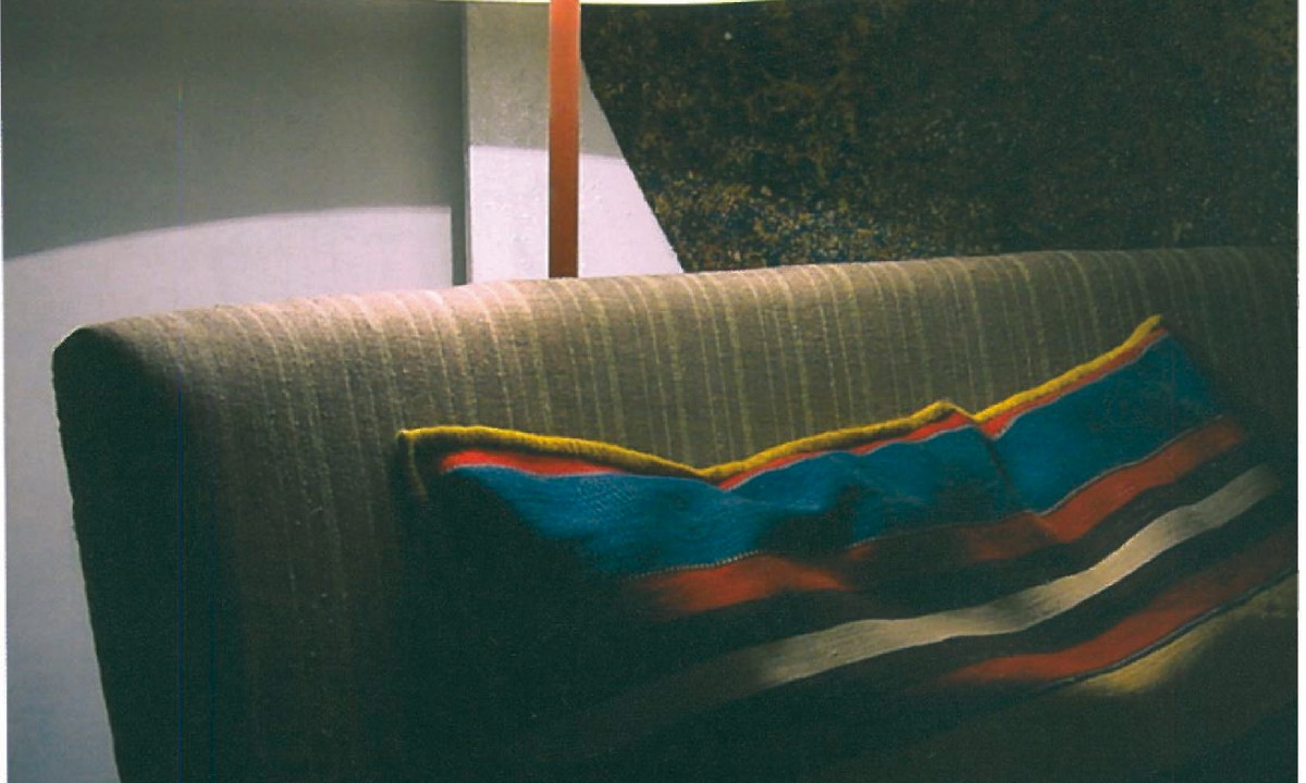 Floor lamp with half-shade beside a leather-and-linen Club chair holding a striped Yazdi silk cushion, against a hand-painted Qajar ceiling fragment