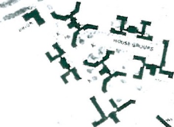 Moore-and-Hutchins 1938 site plan for Goucher College — academic buildings in an irregular three-sided courtyard at the north end of the campus, with residential house-groups extending to the southeast.