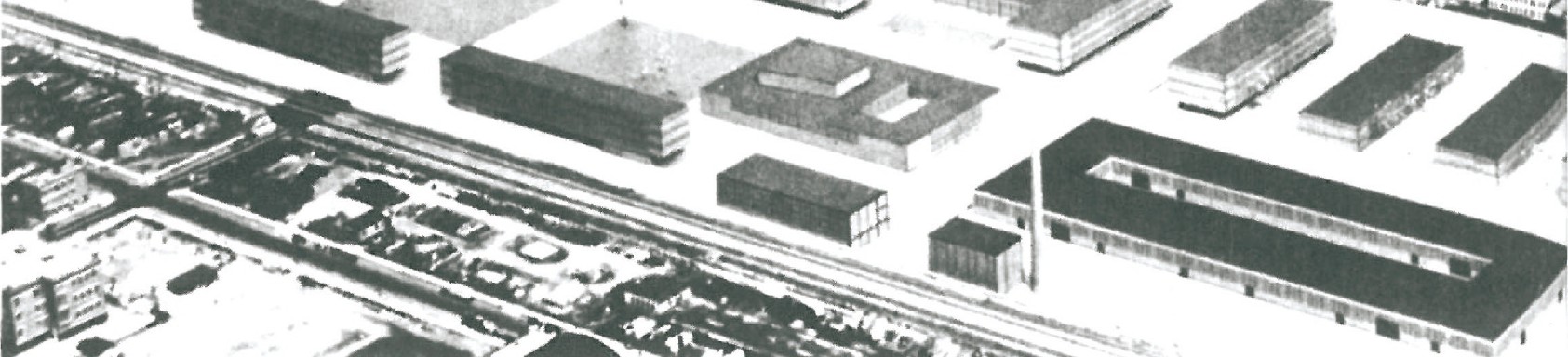 Mies van der Rohe's IIT campus master plan model (1940), superimposed on an aerial photograph of the surrounding Bronzeville neighborhood — rectangular brick-and-steel pavilions arranged on a strict orthogonal grid.