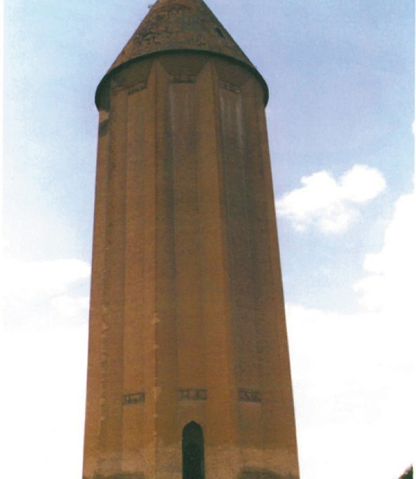 Tall conical brick tower of Gonbad-e-Qaboos in Iran — eleventh-century funerary tower