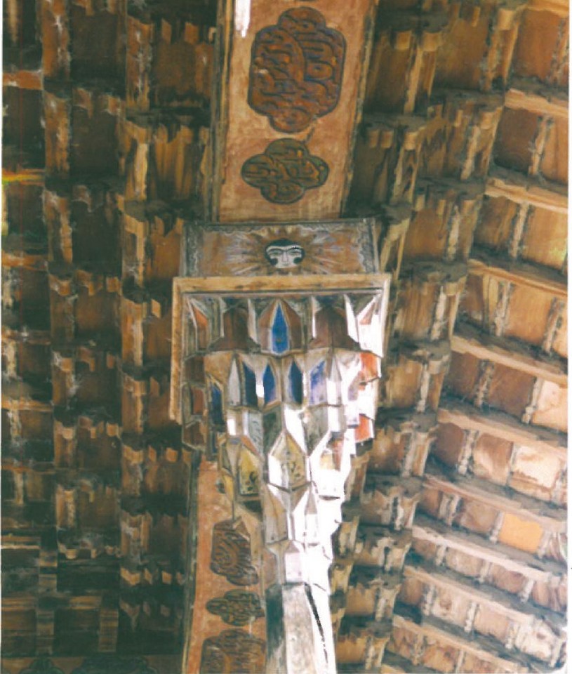 Painted muqarnas-and-wood ceiling of the Maghrah Kala in Babol, Iran — colourful Iranian timber decoration