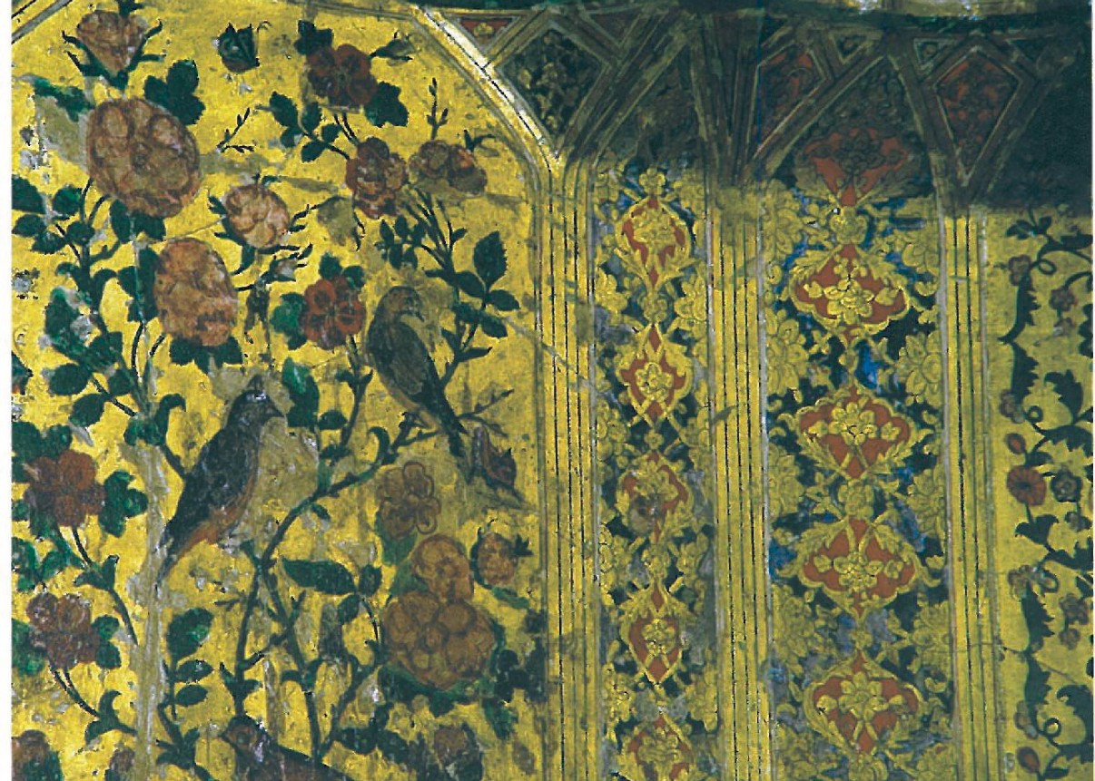 Painted decoration combining a floral and bird pattern with an arabesque — caged songbird at centre