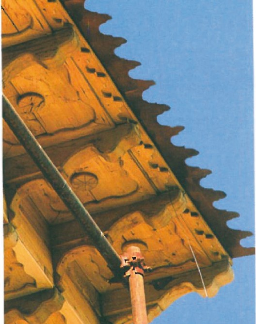 Detail photograph of carved wooden decoration