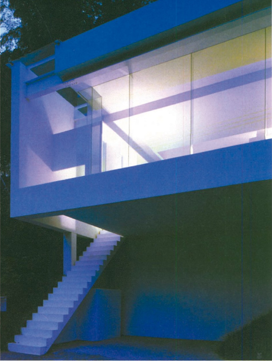 Hiroyuki Arima's Villa in Dazaifu (Japan): a single-flight, handrail-less white concrete stair under a thin overhanging roof, recalling Neolithic huts