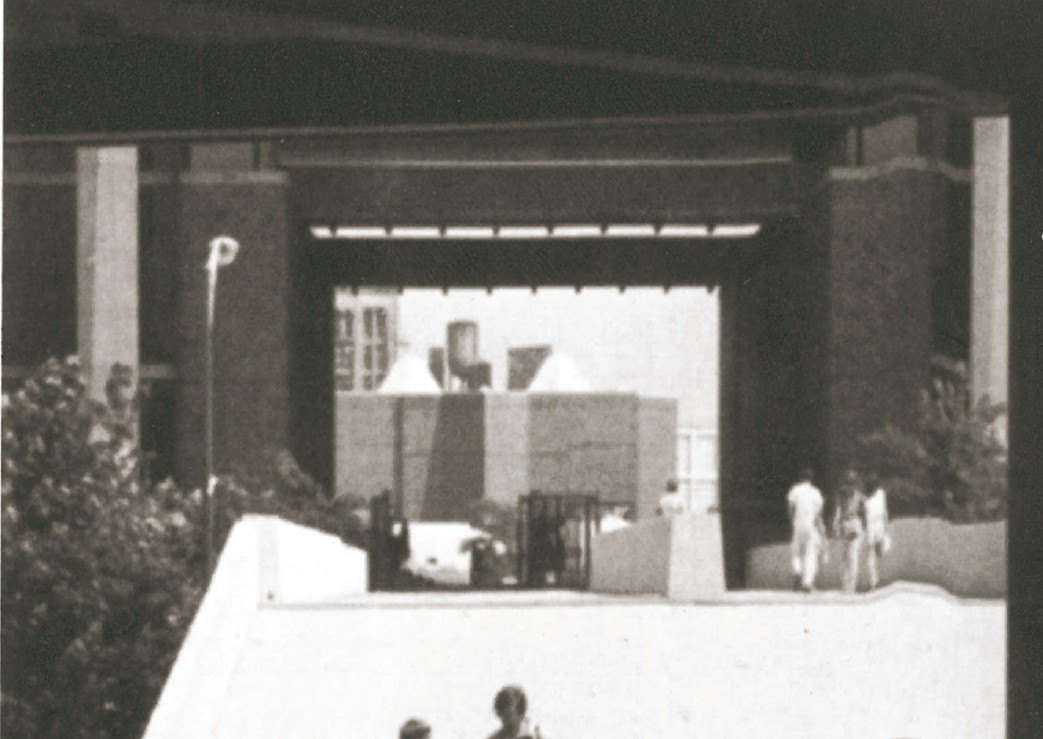 Detail view of the pedestrian skyway at the University of Illinois at Chicago Circle — pre-cast concrete deck spanning between brick lecture buildings.