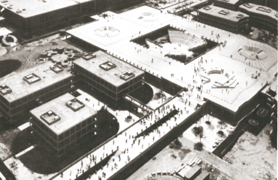Aerial photograph of the central area of the University of Illinois at Chicago Circle (Walter Netsch / SOM) — its elevated pedestrian deck radiating between geometric classroom and lecture-hall pavilions.